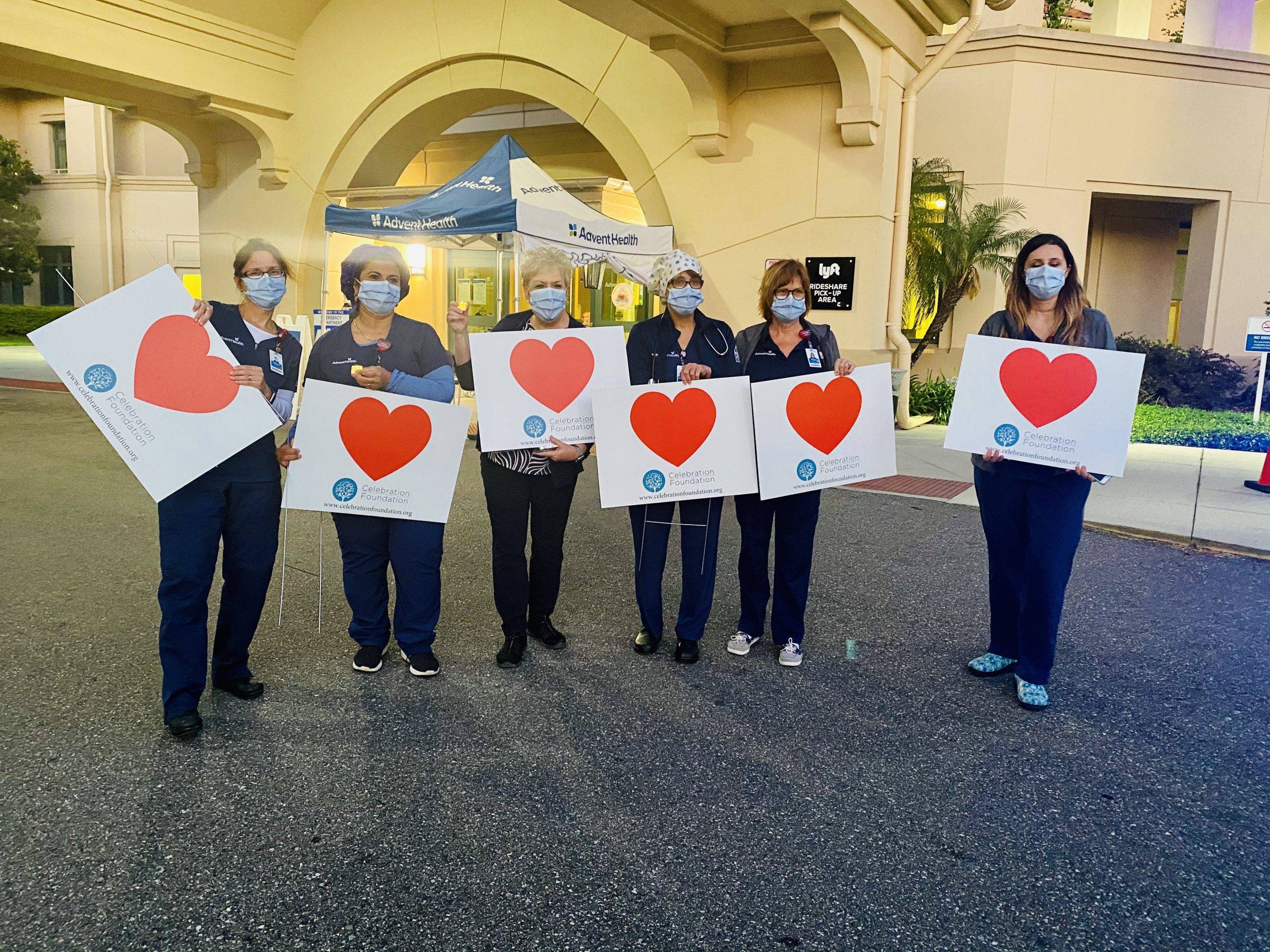 AdventHealth Medical staff with heart signs